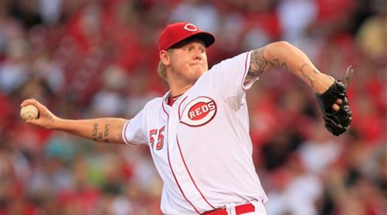 Cincinnati Reds starting pitcher Mat Latos in action against the Philadelphia Phillies in a baseball game, Tuesday, Sept. 4, 2012, in Cincinnati. (AP Photo/Al Behrman)