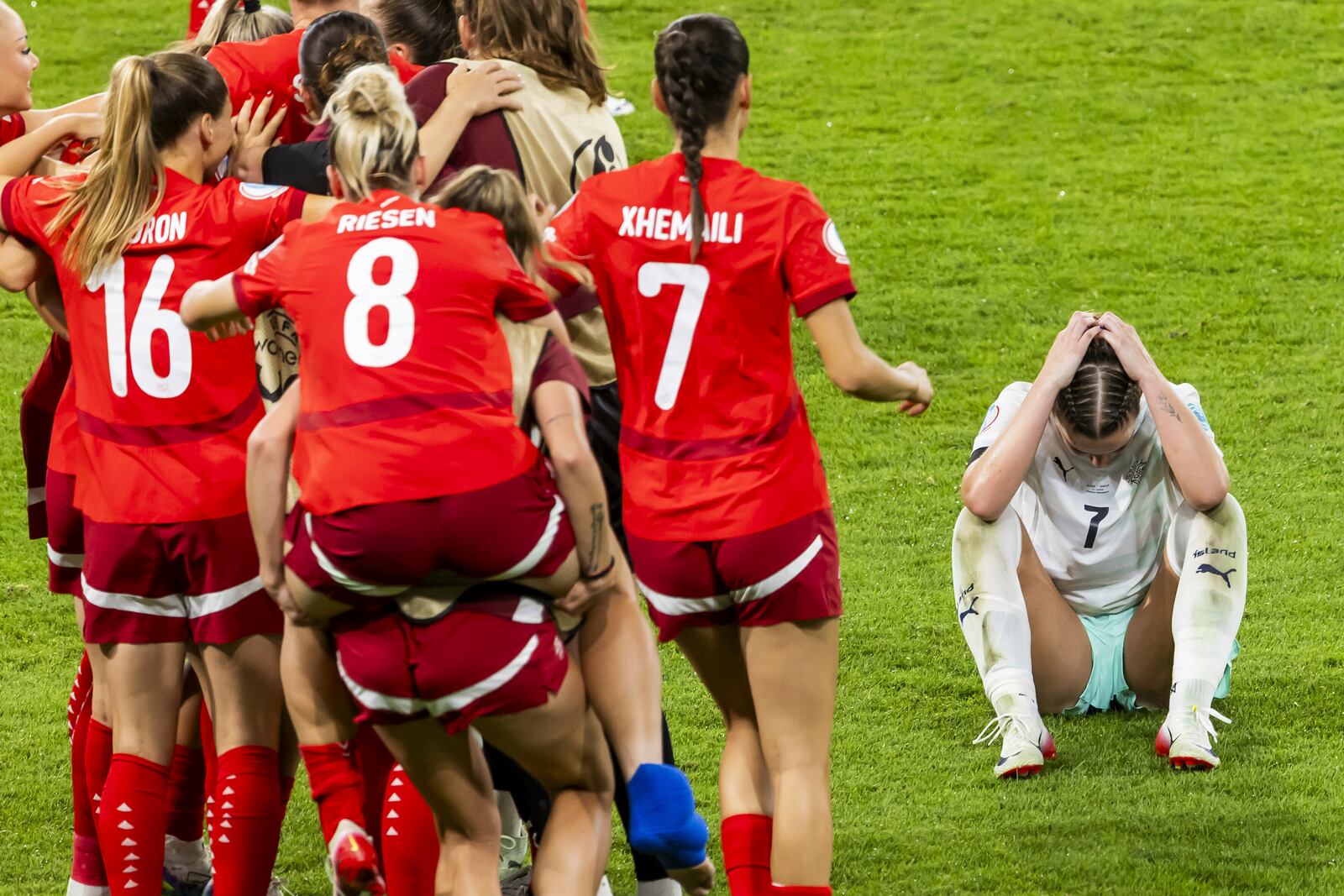 Iceland's Karolina Vilhjalmsdottir , right, reacts at the end of the Euro 2025, group A, soccer match between Switzerland and Iceland at Stadion Wankdorf in Bern, Switzerland, Sunday, July 6, 2025. (Salvatore Di Nolfi/Keystone via AP)