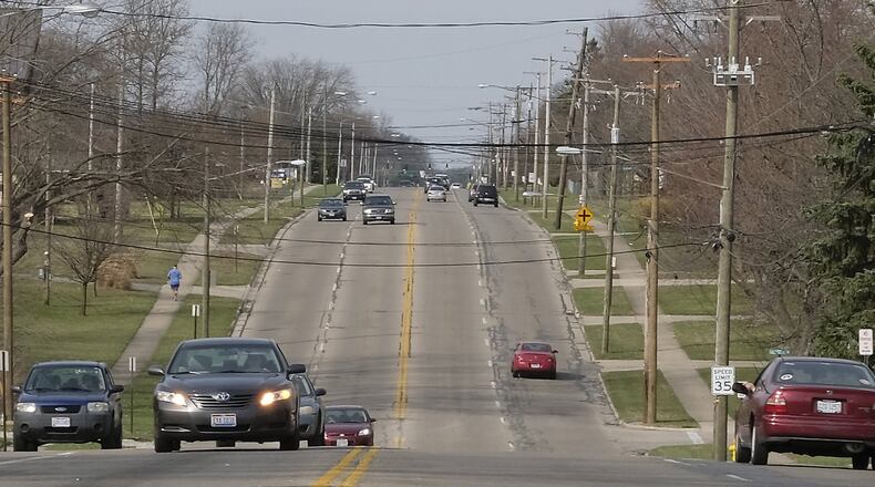 The existing four lanes of Derr Road. BILL LACKEY/STAFF