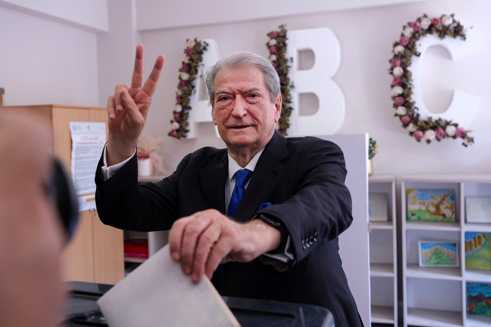 Sali Berisha, leader of Democratic Party of Albania, casts his ballot during a general election where rival Socialist Edi Rama is seeking a fourth term as Albania's prime minister in Tirana, Sunday, May 11, 2025. (AP Photo)