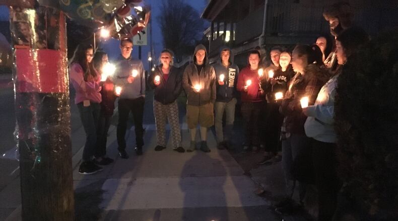 Friends and family of Springfield shooting victim Lindsey Marsh held a vigil Sunday night in Springfield. Marsh died from injuries sustained in a shooting. She was 30 weeks pregnant, but doctors were able to save her child. STAFF