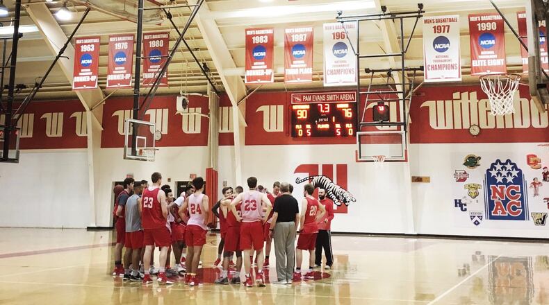Wittenberg huddles at the end of practice on Monday, Feb. 5, 2018, at Pam Evans Smith Arena in Springfield. David Jablonski/Staff