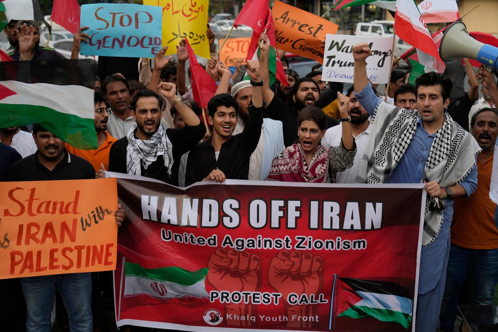 Members of a civil society group hold a demonstration to condemn Israeli strikes on Iran in Lahore, Pakistan, Sunday, June 22, 2025. (AP Photo/K.M. Chaudary)