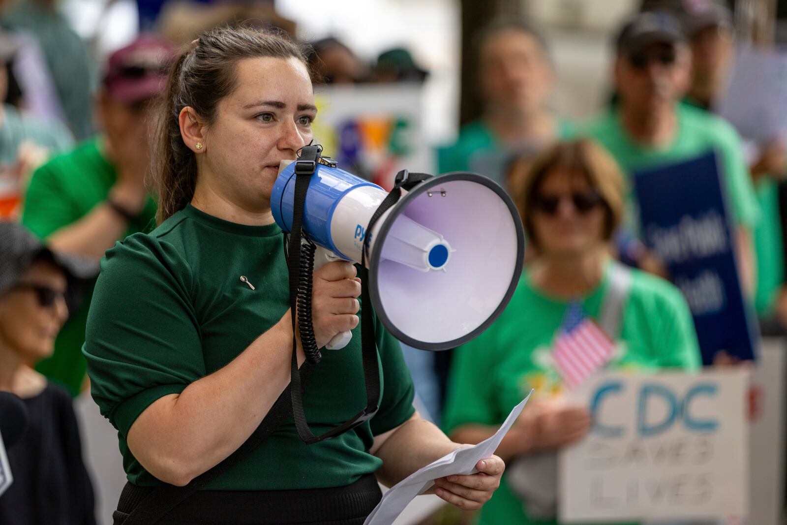 Anna Yousaf speaks at a demonstration protesting President Donald Trump's proposed cuts to health services outside Centers for Disease Control and Prevention (CDC) headquarters in Atlanta on Tuesday, June 10, 2025. (Arvin Temkar/Atlanta Journal-Constitution via AP)