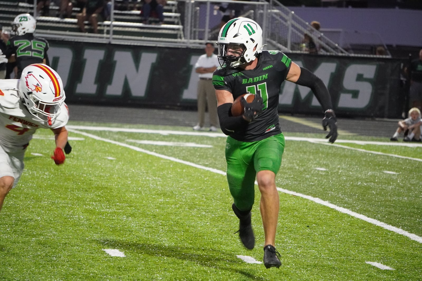 Badin junior Hudson Heid carries the ball against Fenwick on Friday night at the Matandy SportsPlex in Hamilton. MATT VOGT / CONTRIBUTED