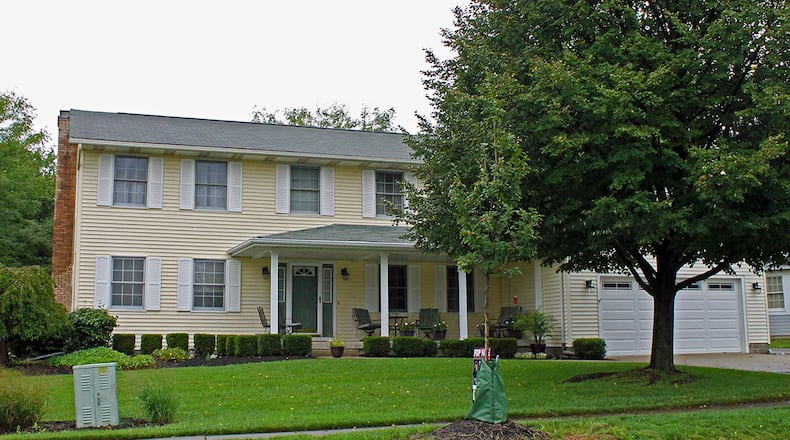 This 2-story home, with 4 bedrooms and about 2,560 sq. ft. of living space, sits on nearly an acre. CONTRIBUTED PHOTO BY VICKIE KAPNAS
