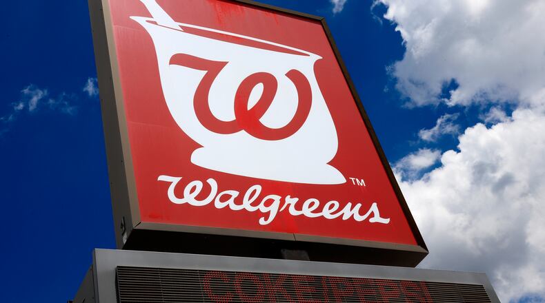 FILE - This June 25, 2019, file photo shows a sign outside a Walgreens Pharmacy in Pittsburgh. Walgreens slashed its earnings forecast for the year, Tuesday, June 27, 2023, and raised a cost-cutting goal after missing analyst profit expectations in its fiscal third quarter. (AP Photo/Gene J. Puskar, File)