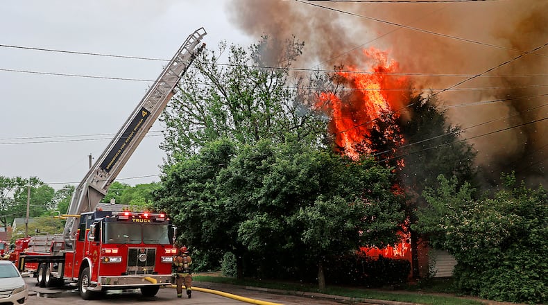 The Springfield Fire Rescue Division responded to a fully involved vacant house fire in the 700 block of Tibbetts Avenue on Monday, May 15, 2023. The fire division arrived to find flames and smoke billowing out of the house that was surrounded by overgrown trees and shrubs. The Tibbetts fire was the second vacant house fire the Springfield Fire Rescue Division responded to Monday morning. Some of the fire units had to respond from a similar scene on Grand Avenue. The Springfield Township Fire Department was called for mutual aid. BILL LACKEY/STAFF