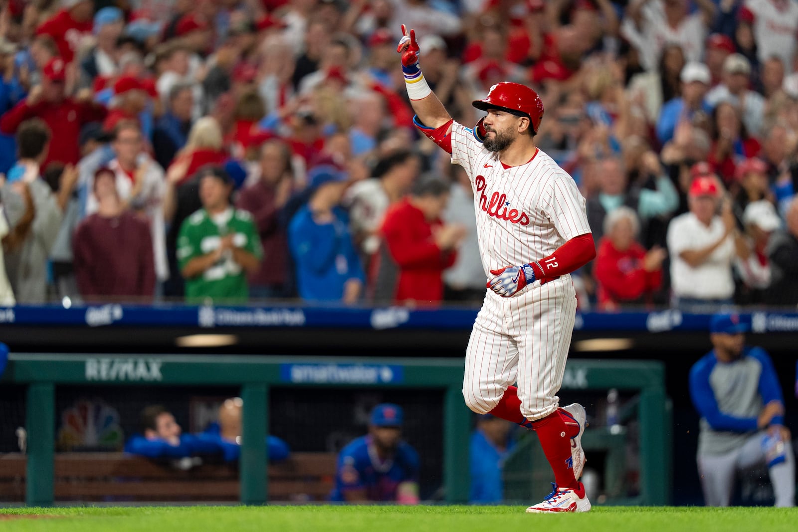 Philadelphia Phillies' Kyle Schwarber reacts to his three-run home run during the seventh inning of a baseball game against the New York Mets, Tuesday, Sep. 9, 2025, in Philadelphia. (AP Photo/Chris Szagola)