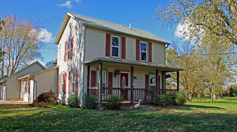 Built in 1900, this remodeled farmhouse sits on 2.79 acres and has about 2,280 sq. ft. of living space, including an updated kitchen. There is a 2-car garage and barn with 6 horse stalls. CONTRIBUTED PHOTO BY VICKIE KAPNAS