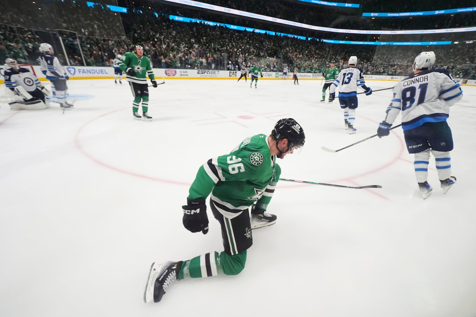 Dallas Stars' Mikko Rantanen (96) celebrates his goal in the third period of Game 3 of a second-round NHL hockey playoff series against the Winnipeg Jets in Dallas, Sunday, May 11, 2025. (AP Photo/Julio Cortez)
