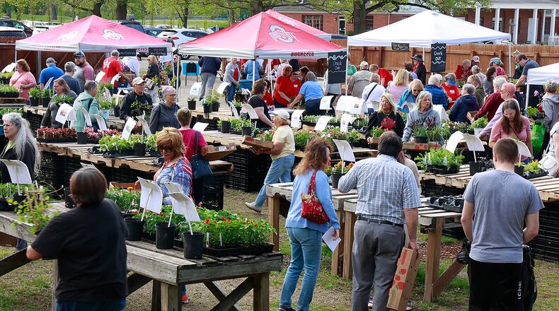 Several events will be held this week in Clark and Champaign Counties, including an open house for those interested in becoming a Master Gardener Volunteer. In this file photo, hundreds of gardeners of all skill levels turned out for the annual Master Gardener Volunteer Plant Sale at the Snyder Park Gardens & Arboretum earlier this year. BILL LACKEY/STAFF