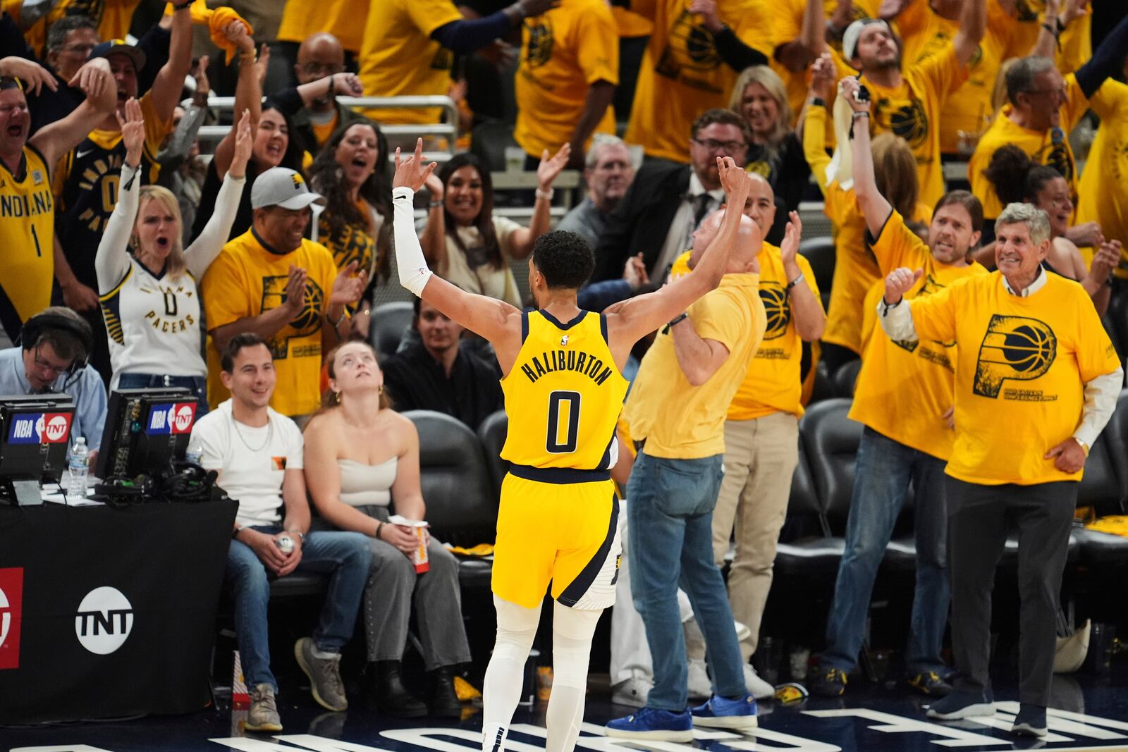 Indiana Pacers guard Tyrese Haliburton celebrates after a teammate made a 3-pointer during the second half of Game 6 of the Eastern Conference finals of the NBA basketball playoffs against the New York Knicks in Indianapolis, Saturday, May 31, 2025. (AP Photo/Michael Conroy)