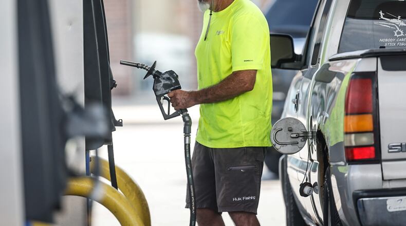 Ron Roberson of Dayton fills up his pick-up truck Wednesday, Aug. 16, 2023 at the UDF on Brown Street. As of midweek, gas prices had risen for five consecutive weeks and the price per gallon was almost as high as a year ago. Roberson paid nearly $100 to fill the tank of his vehicle. JIM NOELKER/STAFF