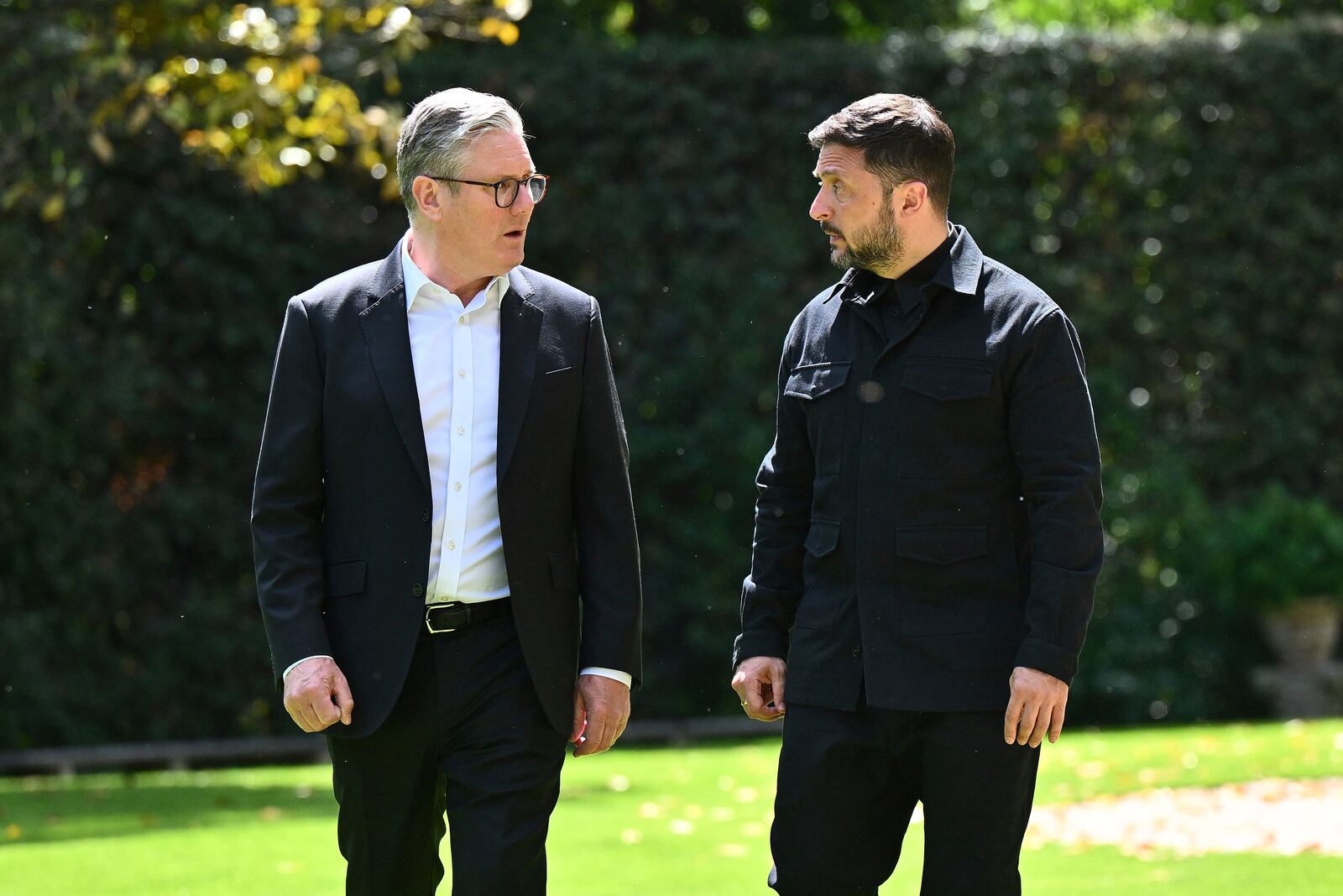 Britain's Prime Minister Keir Starmer, left, and President of Ukraine Volodymyr Zelenskyy walk through the gardens at The Villa Wolkonsky in Rome, Italy, during a bilateral meeting, Saturday April 26, 2025. (Marco M. Mantovani/Getty Images)