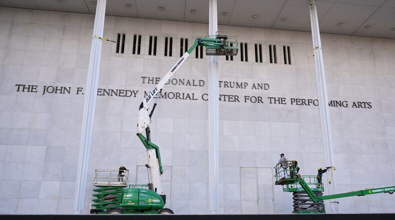 New signage, The Donald J. Trump and The John F. Kennedy Memorial Center for the Performing Arts, is unveiled on the Kennedy Center, Friday, Dec. 19, 2025, in Washington. (AP Photo/Jacquelyn Martin)