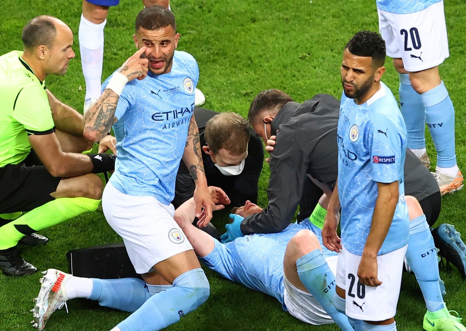 FILE - Manchester City's Kyle Walker reacts as teammate Kevin De Bruyne is assisted after a foul by Chelsea's Antonio Rudiger during the Champions League final soccer match between Manchester City and Chelsea at the Dragao Stadium in Porto, Portugal, Saturday, May 29, 2021. (Michael Steele/Pool via AP, file)