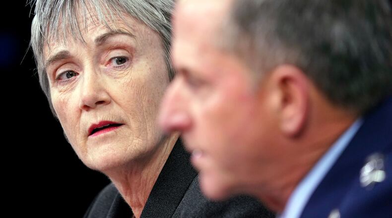 Air Force Secretary Heather Wilson, left, listens to Gen. David L. Goldfein, right, Chief of Staff of the U.S. Air Force at the Pentagon, Thursday, Nov. 9, 2017.