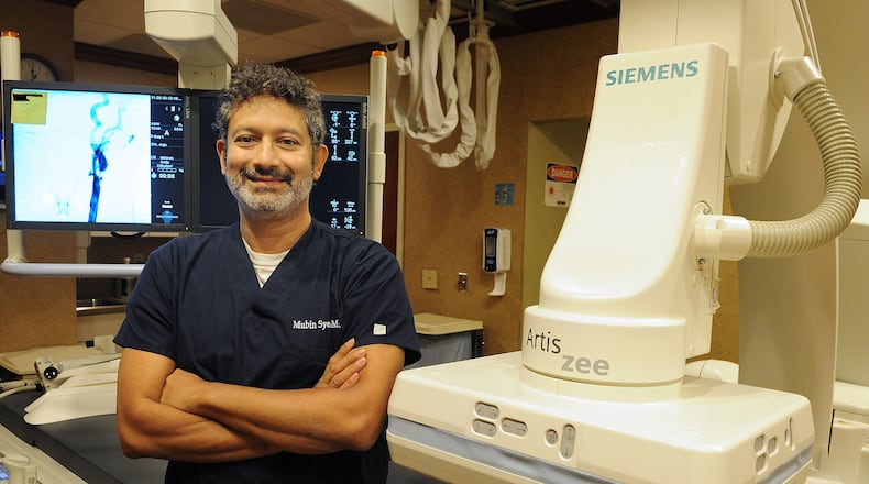 Dr. Mubin Syed, who practices in Springfield and Dayton area, is developing a device to help stroke patients. MARSHALL GORBY\STAFF