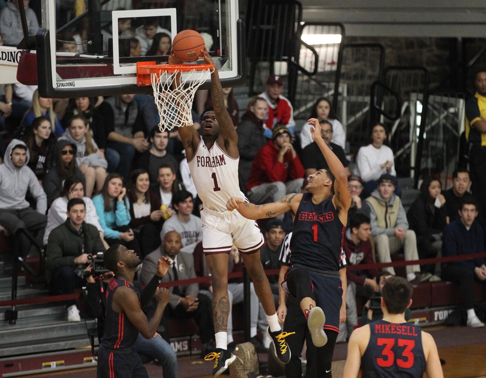  Fordham’s Chuba Ohams dunks against Dayton on Saturday, Jan. 26, 2019, at Rose Hill Gym in Bronx, N.Y.