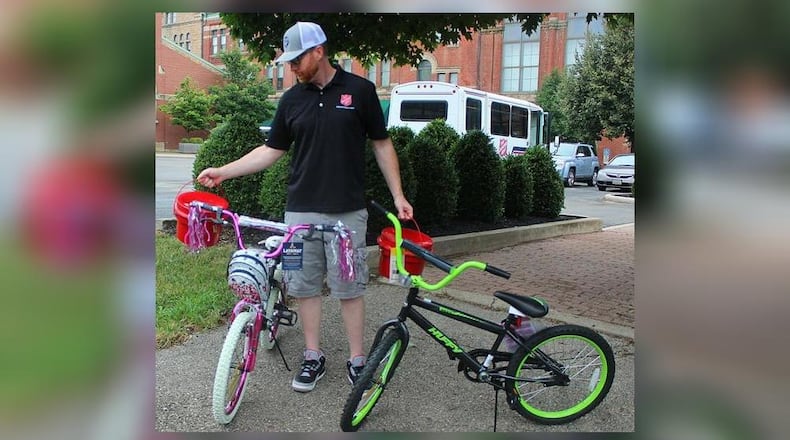 Ryan Ray with The Salvation Army Springfield Corp. gets ready for the Red Kettle Pedal. JEFF GUERINI/STAFF