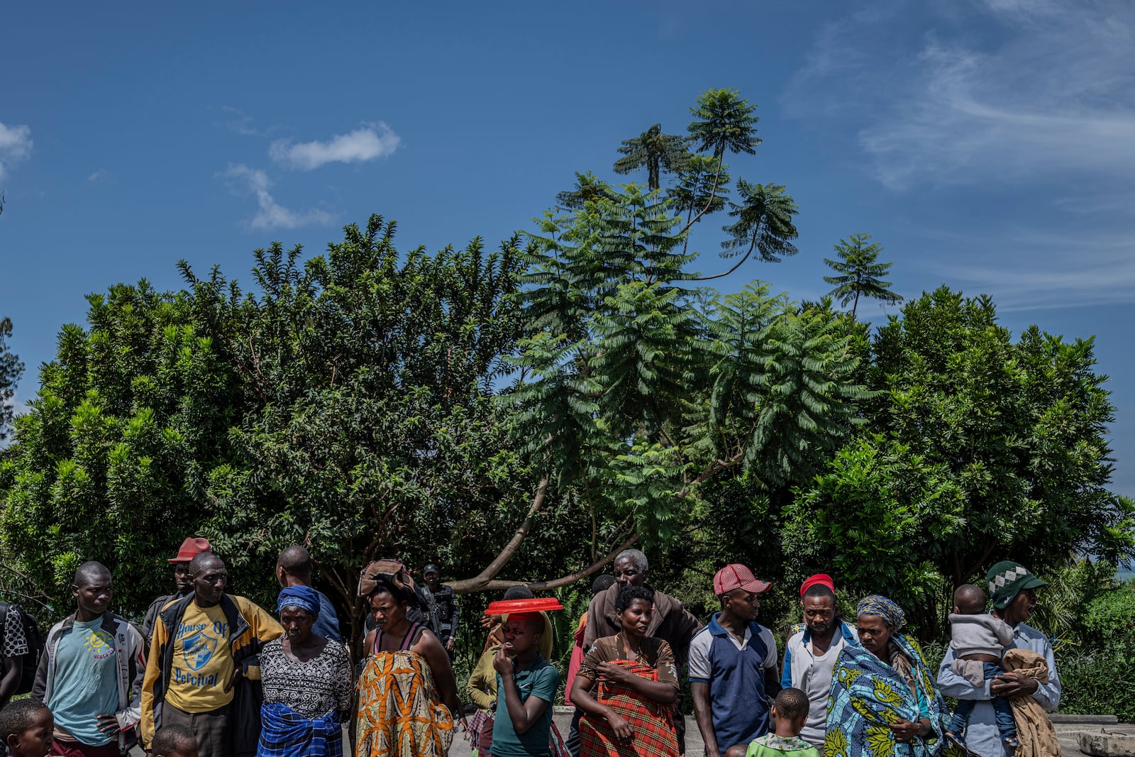 Rwandan refugees who were living in eastern Congo since the 1994 Rwanda genocide wait for repatriation from Goma, Democratic Republic of the Congo, on Saturday, May 17, 2025. (AP Photo/Moses Sawasawa)