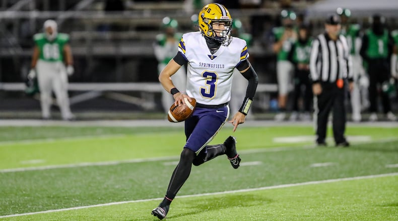 Springfield quarterback Brent Upshaw looks to make a pass vs. Northmont in the regular-season finale on Oct. 24, 2024. Michael Cooper/CONTRIBUTED