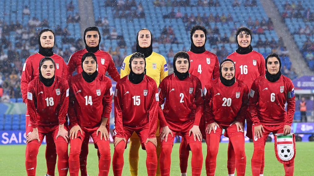 FILE - Iran players pose for a team photo ahead of the Women's Asian Cup soccer match between Iran and the Philippines in Robina, Australia, Sunday, March 8, 2026. (Dave Hunt/AAPImage via AP,File)
