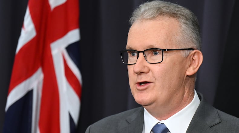 Australian Home Affairs Minister Tony Burke speaks to the media during a press conference at Parliament House in Canberra, Australia, Wednesday, March 11, 2026. (Lukas Coch/AAPImage via AP)/AAP Image via AP)