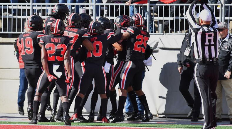 COLUMBUS, OH - NOVEMBER 3:  The Ohio State Buckeyes defense celebrates in the end zone as the referee signals for a safety in the first quarter against the Nebraska Cornhuskers at Ohio Stadium on November 3, 2018 in Columbus, Ohio. Ohio State blocked a punt that rolled out of the end zone.  (Photo by Jamie Sabau/Getty Images)