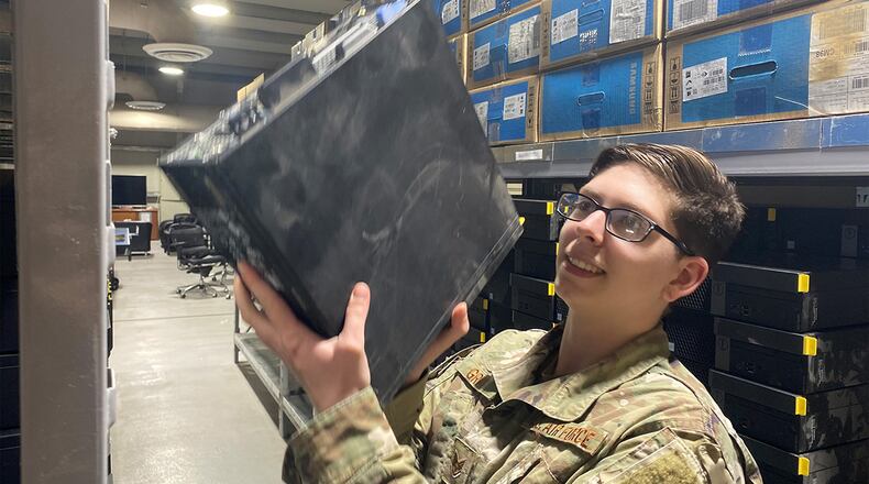 Staff Sgt. Valerie Graw leads a technology refresh project of 55 desktop computers from a deployed location in Southwest Asia. She has been named one of the Air Force’s 12 Outstanding Airmen of the Year for her work in the 88th Communications Squadron. CONTRIBUTED PHOTO