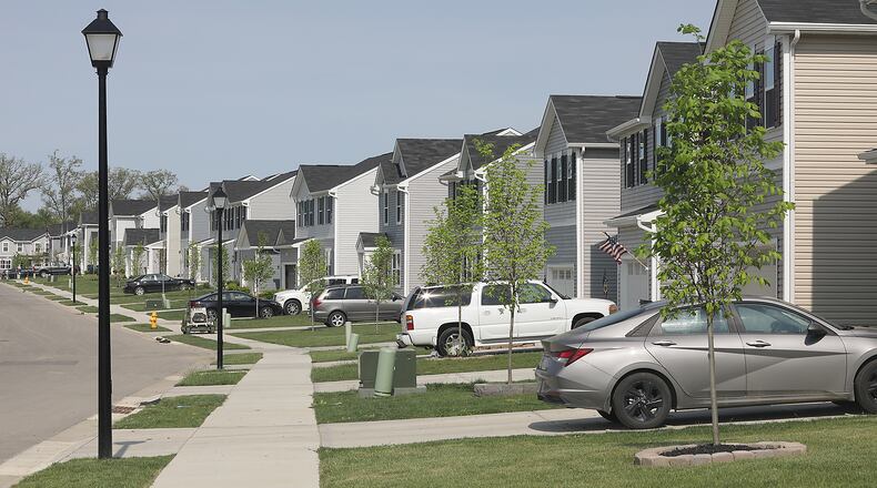 Dozens of new houses in a row. All part of the Bridgewater development. The developer DDC Management is aiming to build 258 more homes as part of a separate housing development called Sycamore Ridge. BILL LACKEY/STAFF