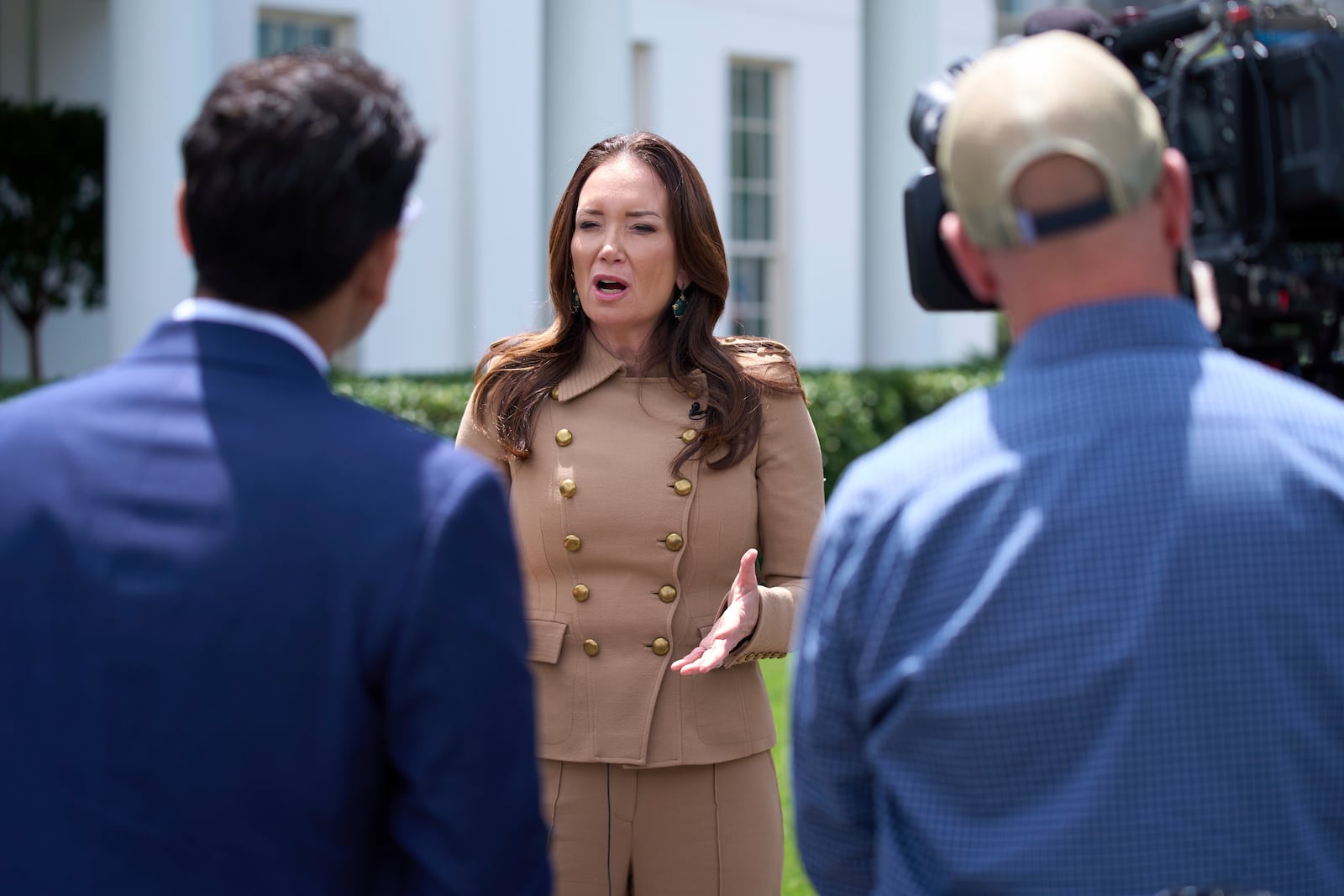 Agriculture Secretary Brooke Rollins speaks with reporters at the White House, Tuesday, May 20, 2025, in Washington. (AP Photo/Evan Vucci)