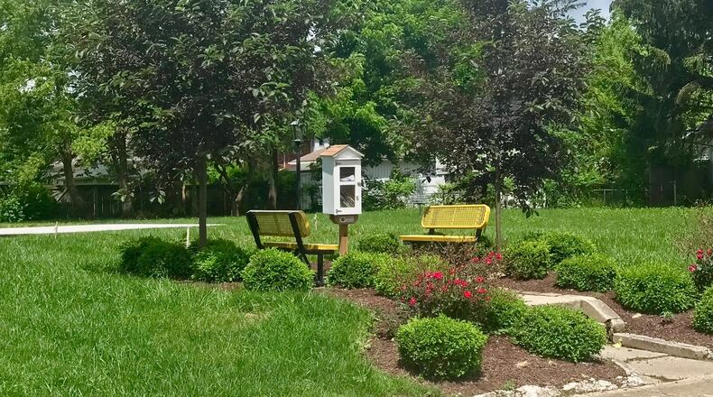 The property at 1609 Woodward Avenue in Springfield was previously occupied by two vacant homes. It was recently redeveloped into a little library and disc golf area through a partnership with local non-profit, The Conscious Connect. CONTRIBUTED