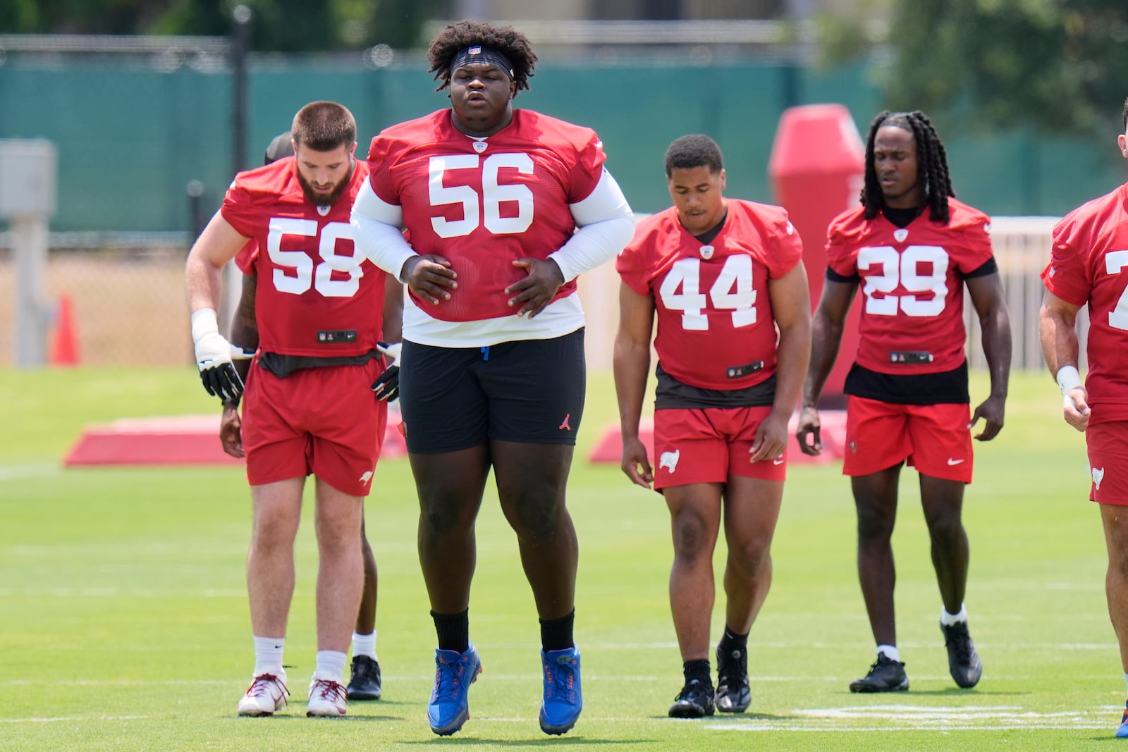 Tampa Bay Buccaneers nose tackle Desmond Watson (56) runs through a drill during the NFL football team's rookie minicamp Friday, May 9, 2025, in Tampa, Fla. (AP Photo/Chris O'Meara)