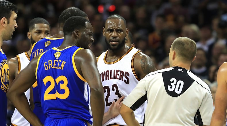 CLEVELAND, OH - JUNE 09: LeBron James #23 of the Cleveland Cavaliers and Kevin Durant #35 of the Golden State Warriors speak after a foul in the third quarter in Game 4 of the 2017 NBA Finals at Quicken Loans Arena on June 9, 2017 in Cleveland, Ohio. NOTE TO USER: User expressly acknowledges and agrees that, by downloading and or using this photograph, User is consenting to the terms and conditions of the Getty Images License Agreement. (Photo by Ronald Martinez/Getty Images)