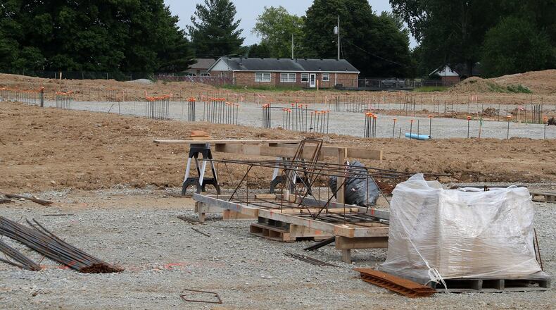 Construction continues on the new Greenon School located behind Indian Valley Middle School Friday. BILL LACKEY/STAFF