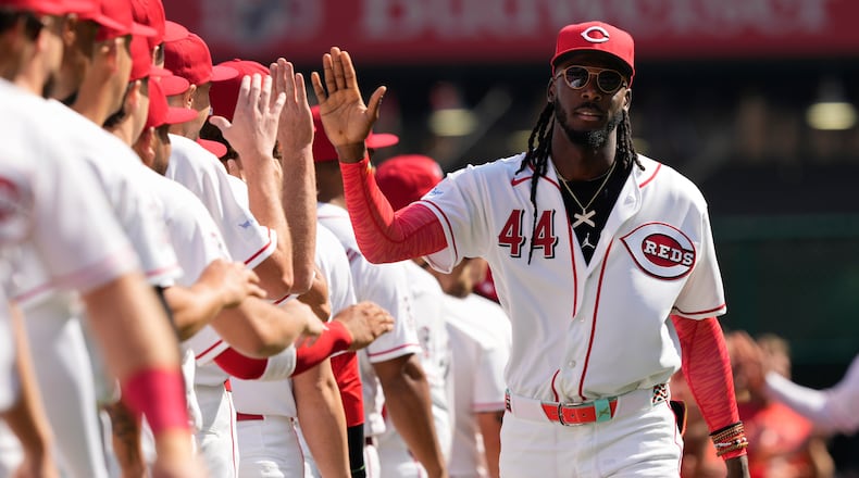 Cincinnati Reds shortstop Elly de la Cruz (44) is introduced before an opening-day baseball game between the Cincinnati Reds and the Boston Red Sox in Cincinnati, Thursday, March 26, 2026. (AP Photo/Carolyn Kaster)