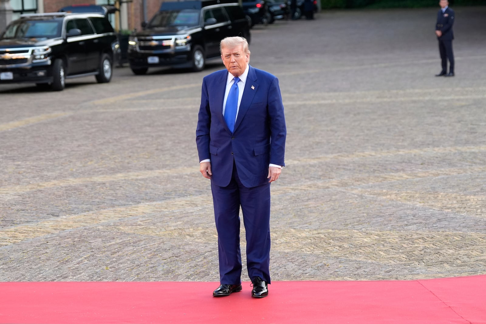 President Donald Trump poses for photographers as he arrives for a formal dinner at the Paleis Huis ten Bosch ahead of the NATO summit in The Hague, Netherlands, Tuesday, June 24, 2025. (AP Photo/Alex Brandon)
