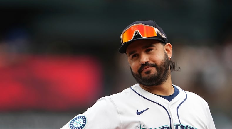 FILE - Seattle Mariners third baseman Eugenio Suarez looks on during a baseball game against the San Diego Padres, Aug. 27, 2025, in Seattle. (AP Photo/Lindsey Wasson, File)