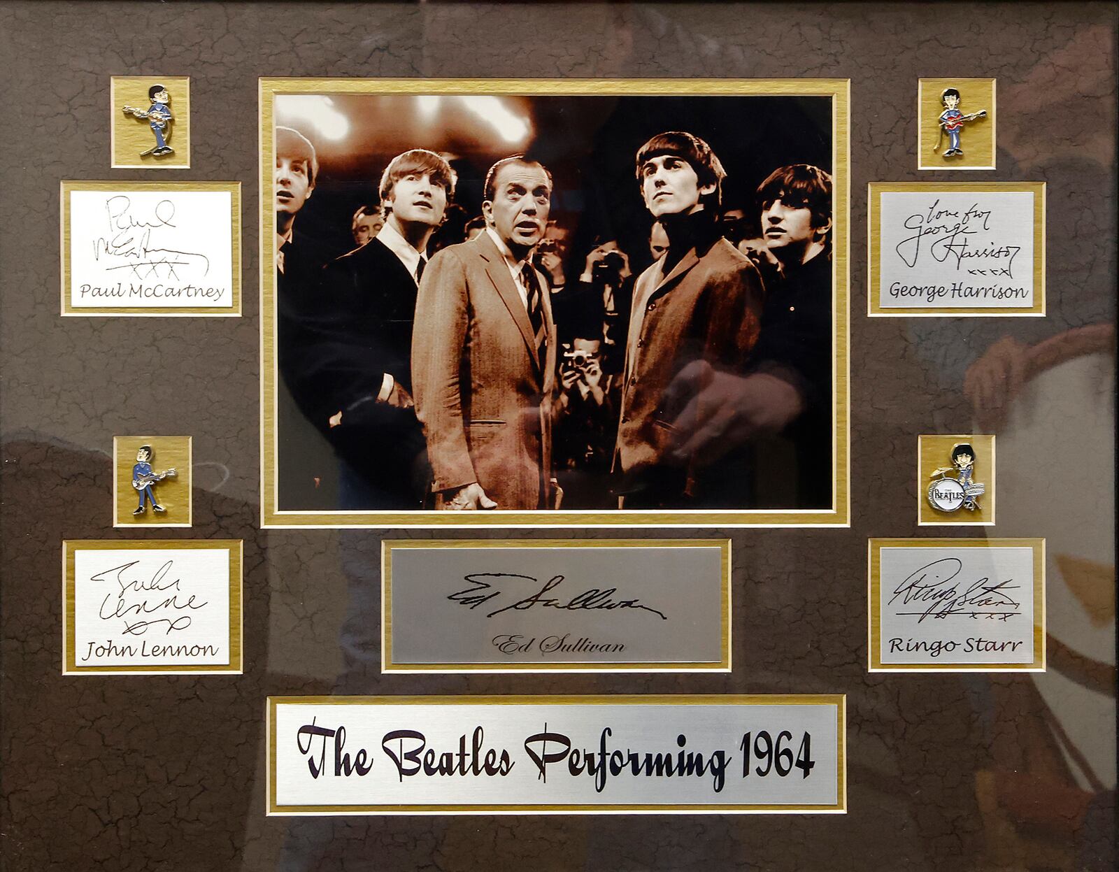 A Beatles picture and autographs is part of John Lippolis' collection. BILL LACKEY/STAFF