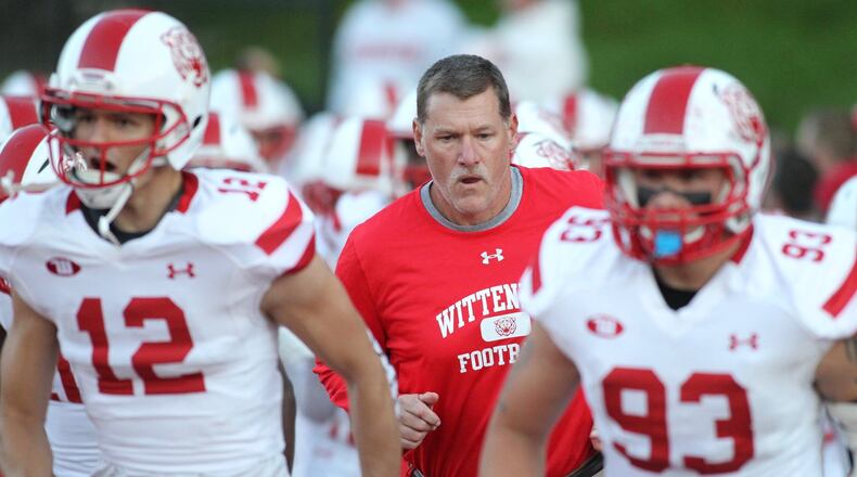 Wittenberg’s Joe Fincham takes the field with the players before a game against Denison on Saturday, Sept. 29, 2018, at Deeds Field in Granville. David Jablonski/Staff