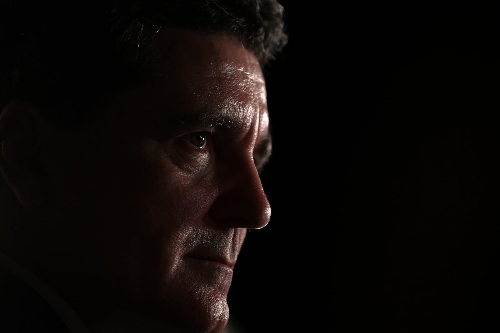 Presidential candidate Nicusor Dan speaks to media after polls closed in the first round of the country's presidential election redo in Bucharest, Romania, Sunday, May 4, 2025. (AP Photo/Eduard Vinatoru)
