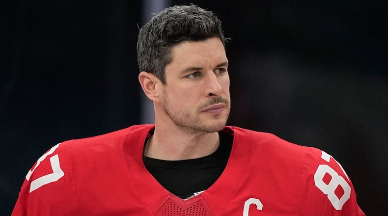 Canada's Sidney Crosby (87) reacts after Canada lost to the United States in a men's ice hockey gold medal game between Canada and the United States at the 2026 Winter Olympics, in Milan, Italy, Sunday, Feb. 22, 2026. (AP Photo/Petr David Josek)