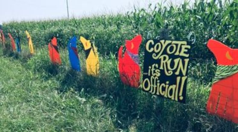 Cutouts celebrate the naming of Coyote Run Creek in Mad River Township. PAM COTTREL/CONTRiBUTOR