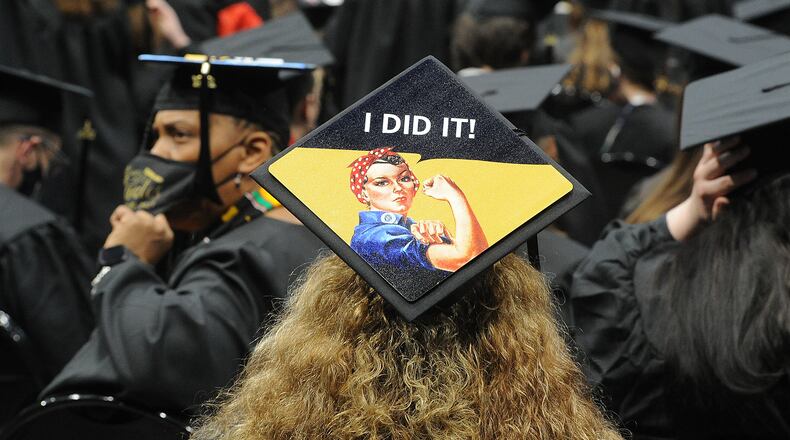 Student loan forgiveness is targeted at borrowers who have smaller loan amounts and make less than $75,000 per year, according to President Joe Biden's administration. Sinclair Community College graduation was held at the University of Dayton Arena Thursday, May 6, 2021. MARSHALL GORBY\STAFF