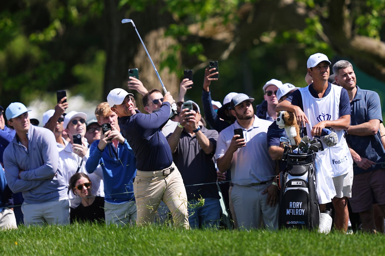 Rory McIlroy, of Northern Ireland, watches his shot on the seventh hole during the third round of the Truist Championship golf tournament at the Philadelphia Cricket Club, Saturday, May 10, 2025, in Flourtown. (AP Photo/Matt Rourke)