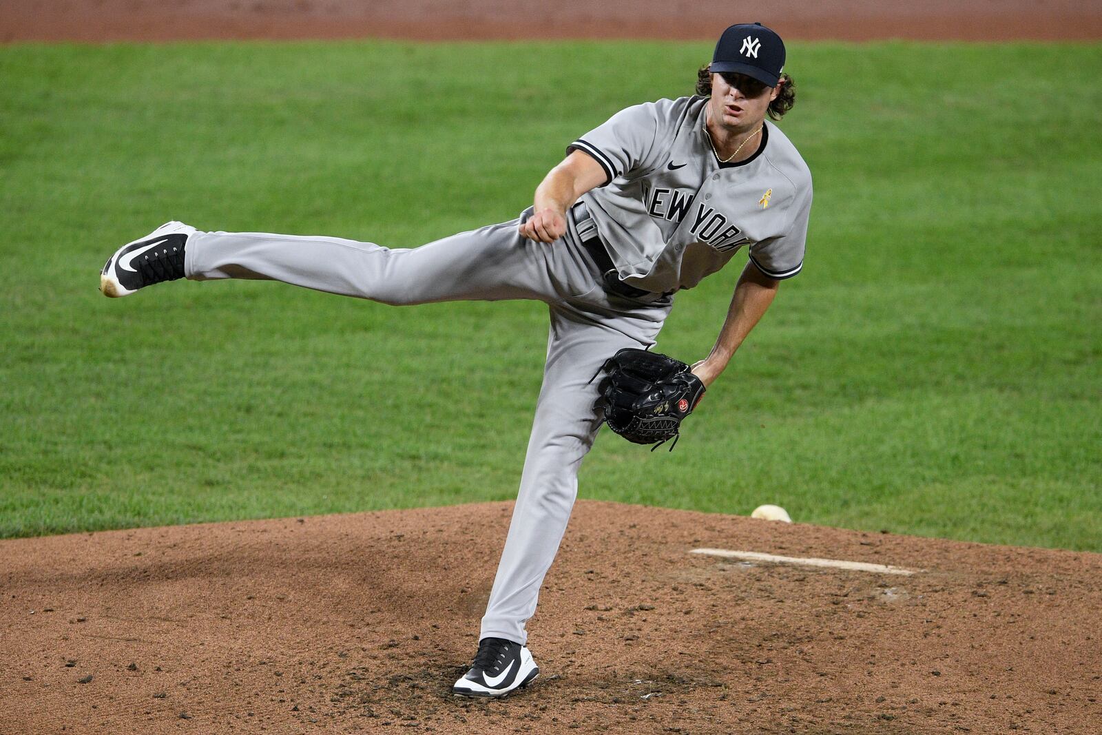 New York Yankees starting pitcher Gerrit Cole follows through during the third inning of the team's baseball game against the Baltimore Orioles, Saturday, Sept. 5, 2020, in Baltimore. (AP Photo/Nick Wass)