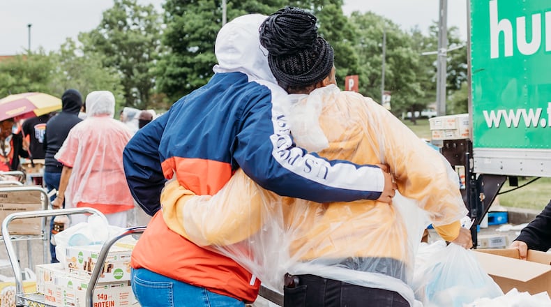 Clients receiving food at a mobile pantry. CONTRIBUTED