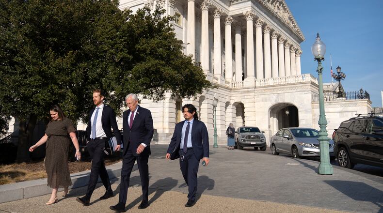 Rep. Steny Hoyer, D-Md., second from right, leaves after speaking on the House floor at the Capitol, Thursday, Jan. 8, 2026, in Washington. (AP Photo/Mark Schiefelbein)